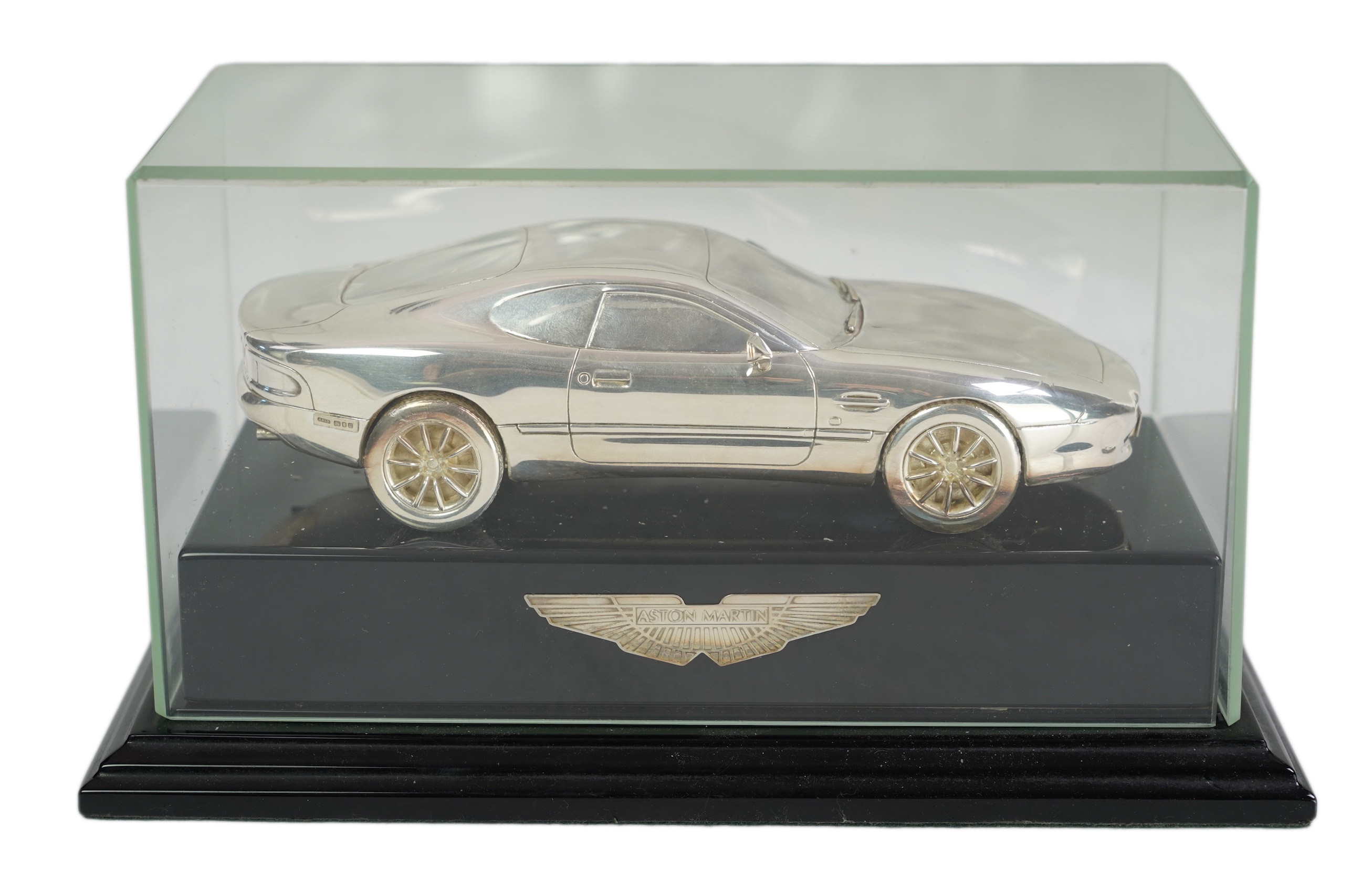 An Elizabeth II miniature silver model of an Aston Martin DB7 Vantage, by Aston Martin Lagonda Design Ltd